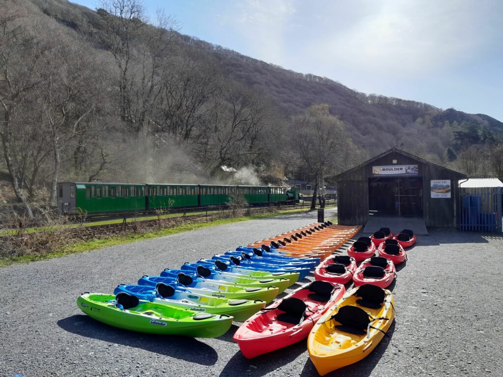 Single kayaks and double kayaks ready for hire on Llyn Padarn